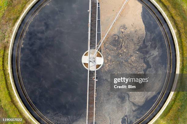 clarifier at wastewater treatment plant, aerial view - filtration stock pictures, royalty-free photos & images