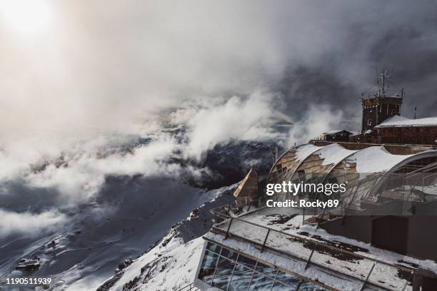 zugspitze mountain, top of germany on a sunny day in november - religious icon stock pictures, royalty-free photos & images