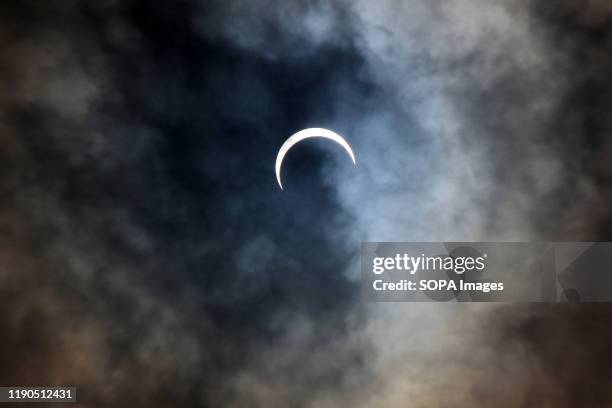 The phenomenon of the 'ring of fire' solar eclipse seen in a number of regions in Lhokseumawe. The "ring of fire" solar eclipse occurred when the...