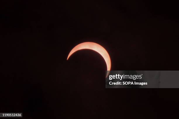 The phenomenon of the 'ring of fire' solar eclipse seen in a number of regions in Lhokseumawe. The "ring of fire" solar eclipse occurred when the...