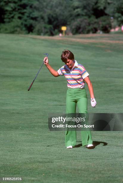 Women's golfer Jo Ann Washam reacts after a shot during tournament play circa 1977. Washam was on the LPGA Tour from 1973-89.