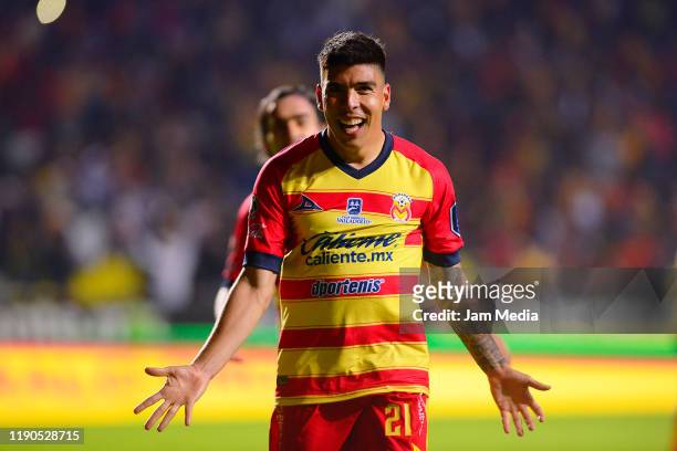 Luis Angel Mendoza of Morelia celebrates after scoring the third goal of his team during the quarterfinals first leg match between Morelia and Leon...