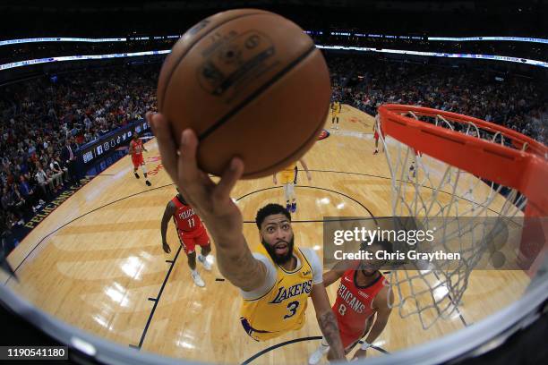 Anthony Davis of the Los Angeles Lakers shoots the ball over Jahlil Okafor of the New Orleans Pelicans at Smoothie King Center on November 27, 2019...