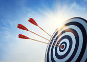 Archery target and arrow 3D on blue sky