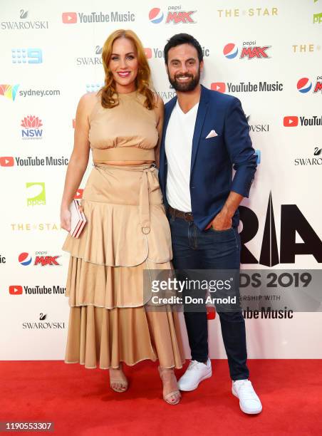 Jules Robinson and Cameron Merchant arrives for the 33rd Annual ARIA Awards 2019 at The Star on November 27, 2019 in Sydney, Australia.