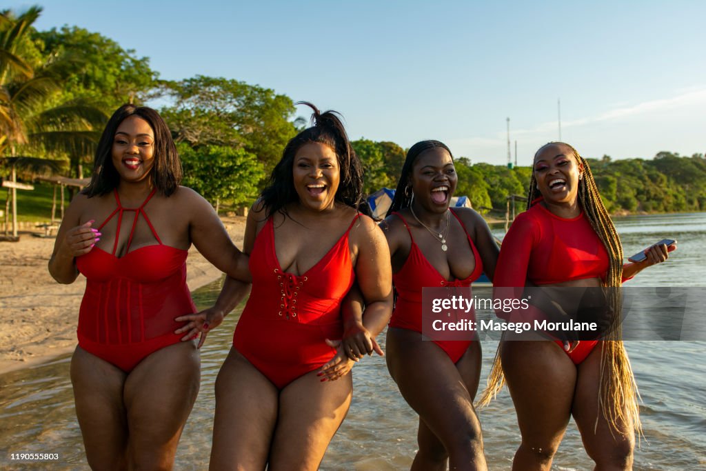 Beautiful black women having fun at the beach