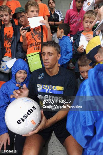 Hernan Crespo of FC Parma signs a ball during a FC Parma training session on July 14, 2011 in Levico Terme Trento, Italy.