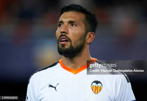 Ezequiel Garay of Valencia looks on prior to the UEFA Champions League group H match between Valencia CF and Chelsea FC at Estadio Mestalla on...