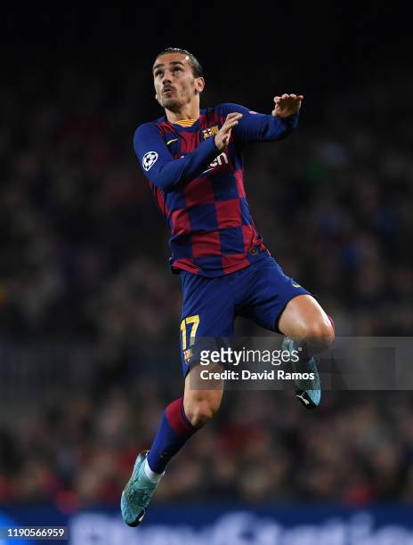 Antoine Griezmann of FC Barcelona jumps for the ball during the UEFA Champions League group F match between FC Barcelona and Borussia Dortmund at...