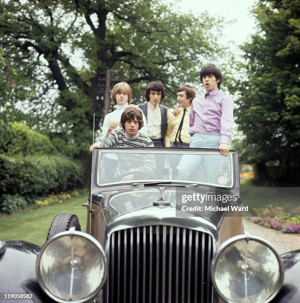 The Rolling Stones, in a vintage car 1964. From left to right Brian Jones, Mick Jagger, Bill Wyman, Charlie Watts and Keith Richards.