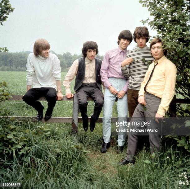 The Rolling Stones posing for a picture in the countryside, Brian Jones, Bill Wyman, Keith Richards, Mick Jagger and Charlie Watts, 1964.
