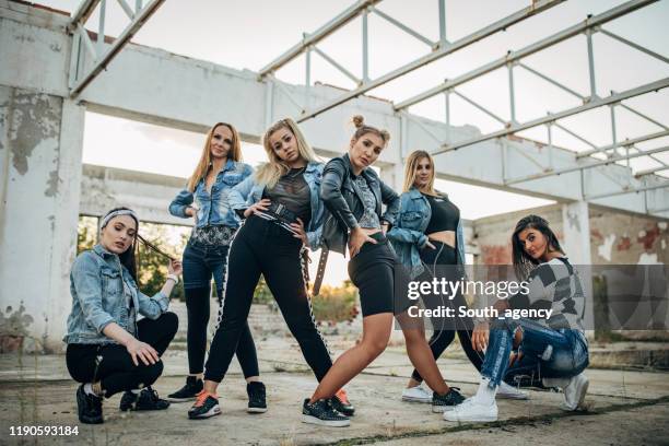 group of urban female dancers - dance troupe stock pictures, royalty-free photos & images