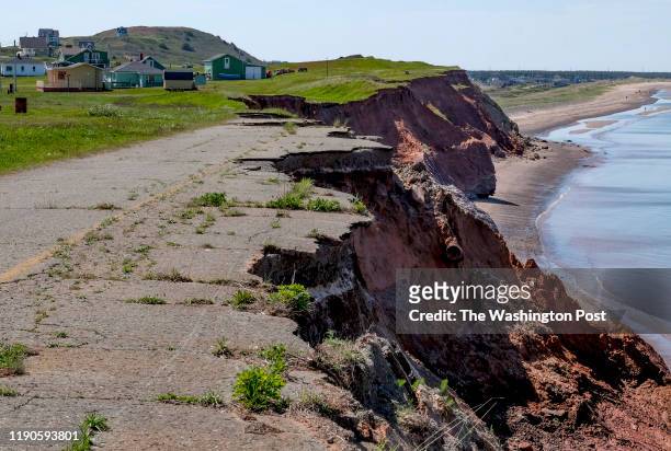 Road destroyed by erosion in Magdalen Islands, Quebec on June 19, 2019. Adele Chiasson lives near this stretch of coastline and is afraid to go in...