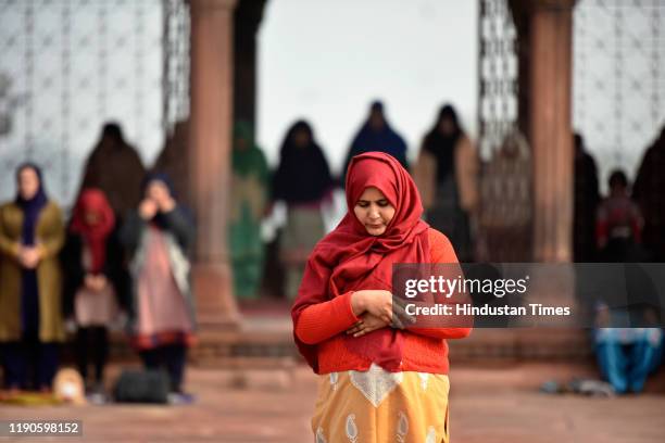 Woman prays, at Jama Masjid, on December 27, 2019 in New Delhi, India.