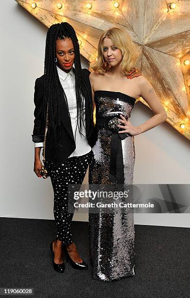 Solange Knowles and Peaches Geldof attend a party for Dolce And Gabbana hosted by Net-a-Porter at Westfield on July 14, 2011 in London, England.