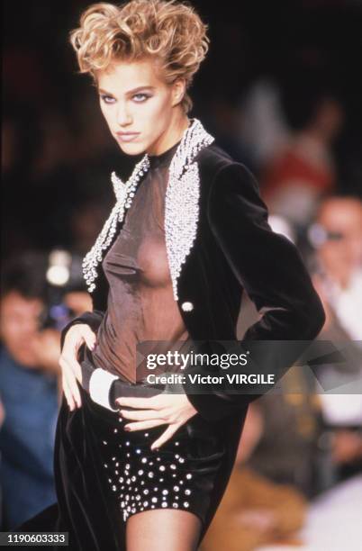 Emma Sjoberg walks the runway at the Martine Sitbon Ready to Wear Fall/Winter 1991-1992 fashion show during the Paris Fashion Week in March, 1991 in...