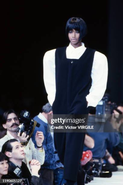 Model walks the runway at the Yoshji Yamamoto Ready to Wear Fall/Winter 1989-1990 fashion show during the Paris Fashion Week in March, 1989 in Paris,...