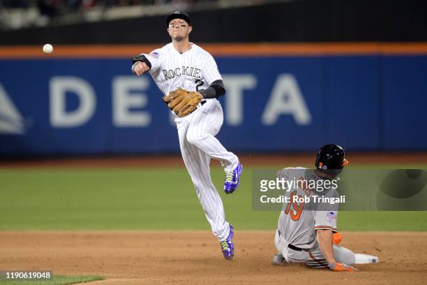 Troy Tulowitzki of the Colorado Rockies turns a double play during the 84th MLB All-Star Game at Citi Field on Tuesday, July 16, 2013 at Citi Field...