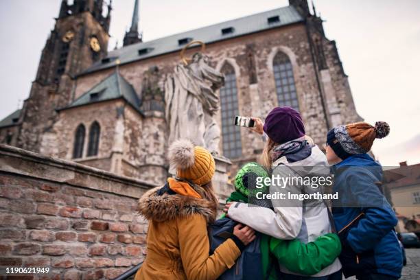 family sightseeing city of brno in autumn - czech republic stock pictures, royalty-free photos & images