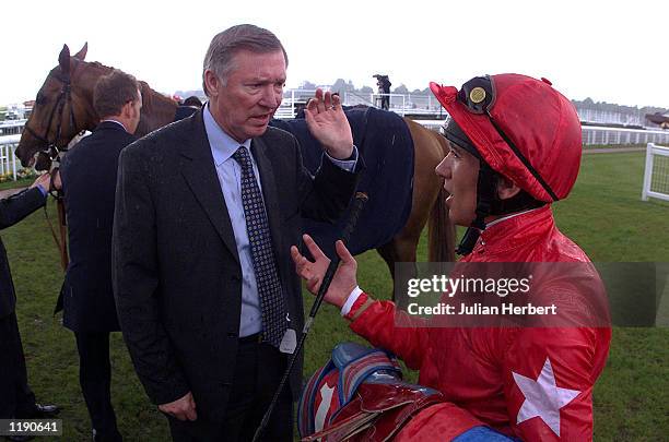 Sir Alex Ferguson talks to Frankie Dettori after his horse Candleriggs finishes 2ND in The Robert Half International Rated Stakes run at York....