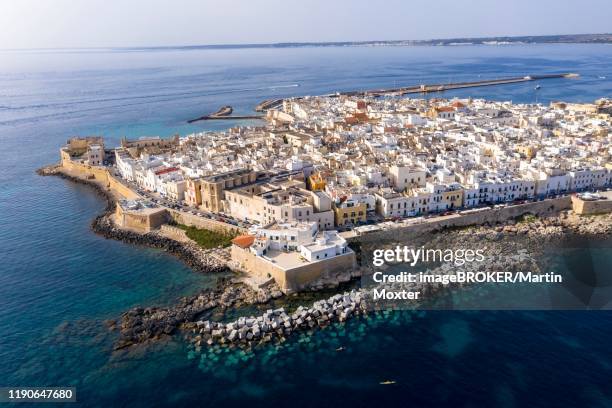 aerial view, old town with fort, city wall and harbour, gallipoli, province of lecce, salento peninsula, apulia, italy - gallipoli foto e immagini stock
