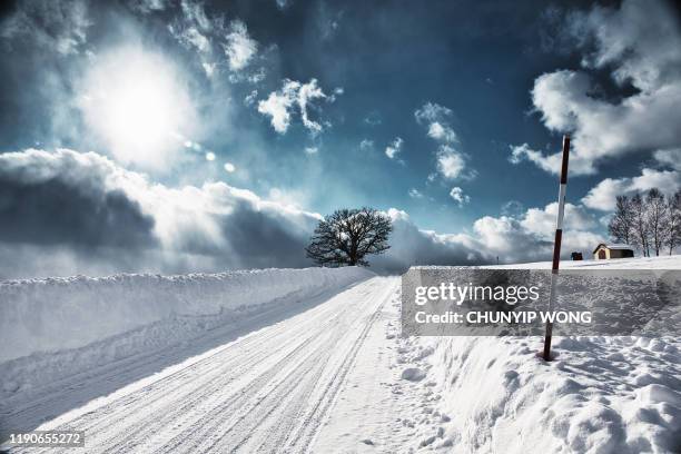 winter landschap. de biei hokkaido japan - snow covered road stockfoto's en -beelden
