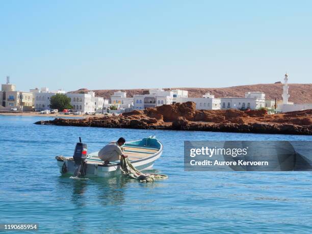 traditional fishing village of sur on oman coastline - oman muscat stock pictures, royalty-free photos & images