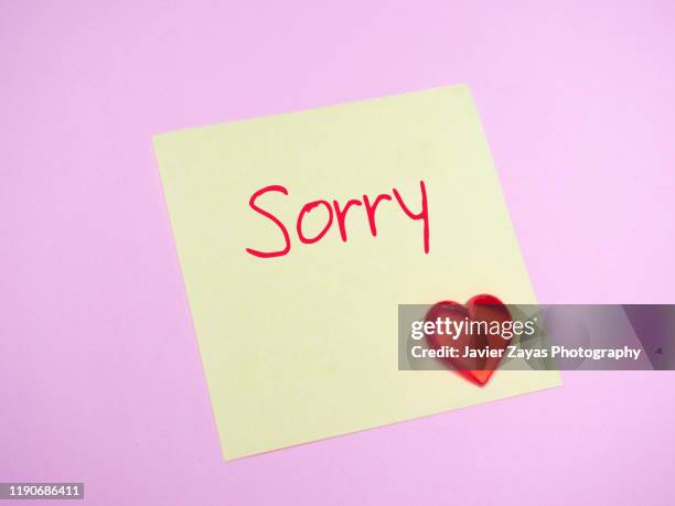 Sorry On Note Sorry Message In Yellow Sticky Note Photos and Premium High Res ...