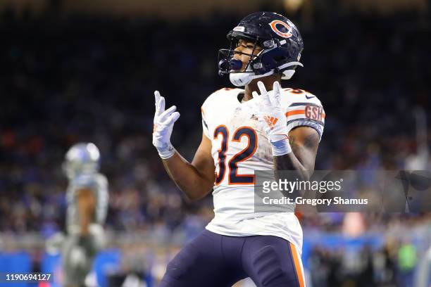 David Montgomery of the Chicago Bears celebrates his fourth quarter touchdown against the Detroit Lions at Ford Field on November 28, 2019 in...