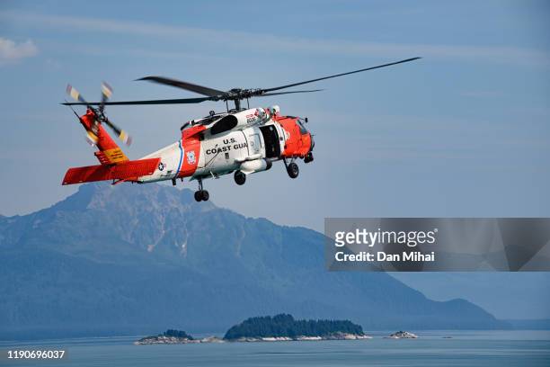 coast guard helicopter above the inside passage - inside helicopter ストックフォトと画像
