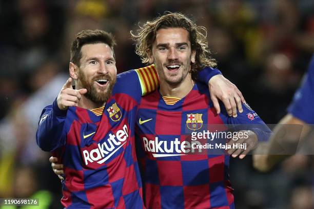 Lionel Messi of Barcelona celebrates with Antoine Griezmann of FC Barcelona after scoring his team's second goal during the UEFA Champions League...