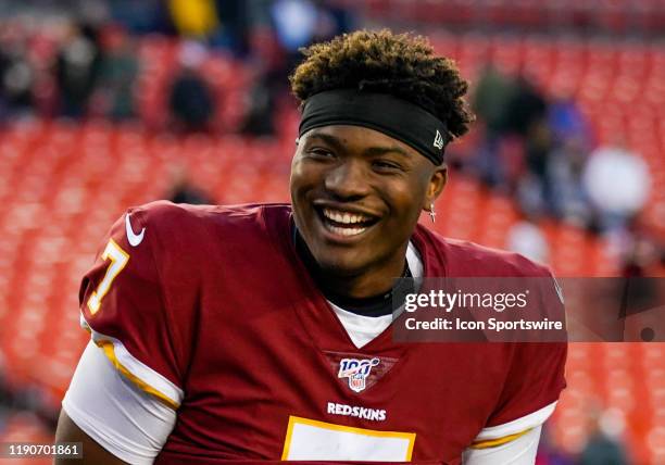 Washington Redskins Quarterback Dwayne Haskins laughs with teammates following the game between the New York Giants and the Washington Redskins on...
