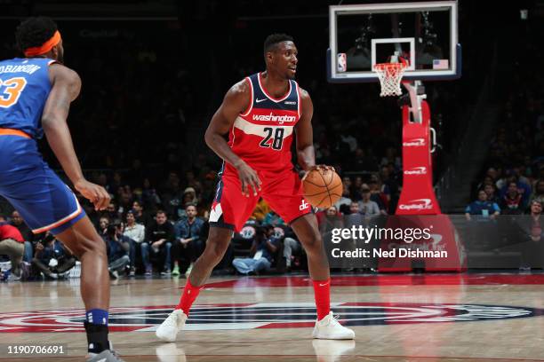 Ian Mahinmi of the Washington Wizards handles the ball during the game against the New York Knicks on December 28, 2019 at Capital One Arena in...