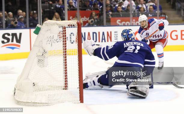 New York Rangers defenseman Tony DeAngelo scores on Toronto Maple Leafs goaltender Frederik Andersen in overtime as the Toronto Maple Leafs lose to...