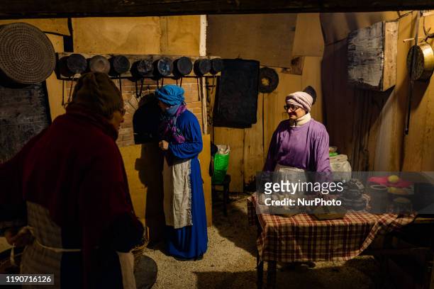 The figures recreate the characters of the Living Nativity in Palombaio, a small hamlet of Bitonto in Puglia, on December 28th