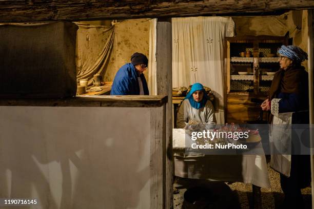 The figures recreate the characters of the Living Nativity in Palombaio, a small hamlet of Bitonto in Puglia, on December 28th