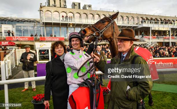 Dublin , Ireland - 29 December 2019; Patrick Mullins with Sharjah, his father and trainer Willie Mullins and mother Jackie after winning the Matheson...