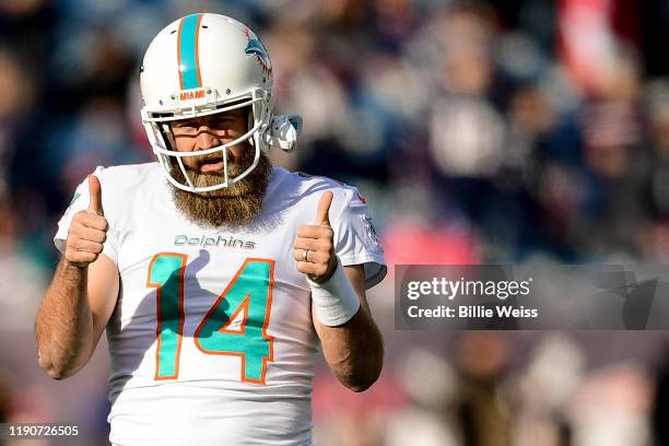 Ryan Fitzpatrick of the Miami Dolphins reacts before a game against the New England Patriots at Gillette Stadium on December 29, 2019 in Foxborough,...