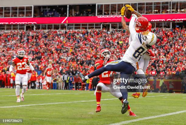 Tyrann Mathieu of the Kansas City Chiefs intercepts a second quarter pass intended for Mike Williams of the Los Angeles Chargers at Arrowhead Stadium...