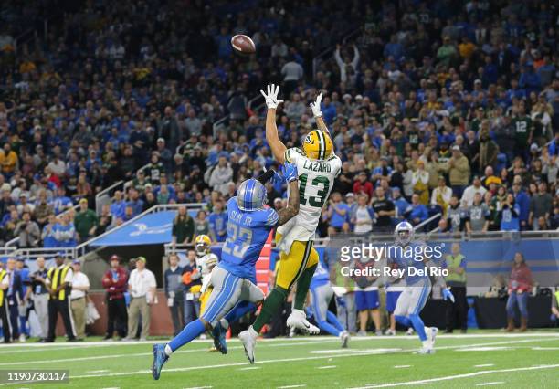 Allen Lazard of the Green Bay Packers catches a fourth quarter touchdown pass in front of Darius Slay of the Detroit Lions at Ford Field on December...