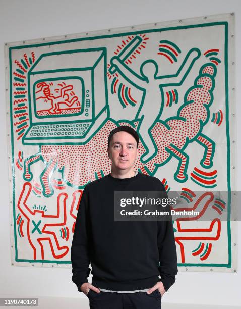 Brian Donnelly aka KAWS attends the Keith Haring | Jean Michel-Basquiat: Crossing Lines Exhibition Preview at National Gallery of Victoria on...