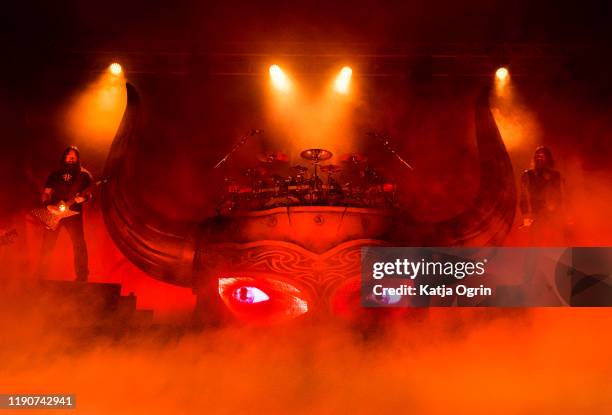 Ted Lundström, Johan Hegg and Jocke Wallgren of Amon Amarth perform at O2 Academy Birmingham on November 28, 2019 in Birmingham, England.