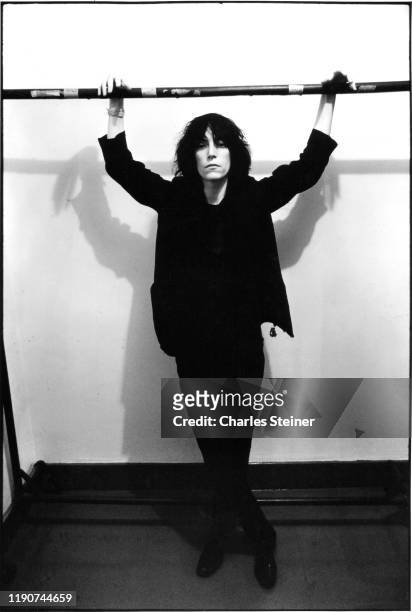 Patti Smith poses before performing at the event "Arista Records Salutes New York with a Festival of Great Music” at City Center. September 21, 1975.