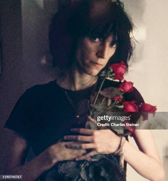 Patti Smith poses backstage before performing at the event "Arista Records Salutes New York with a Festival of Great Music” at City Center. September...