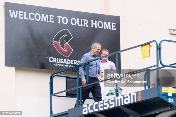 Crusaders Chief Executive Officer Colin Mansbridge and Crusaders Chairman Grant Jarrold react in front of the new Crusaders logo following a...