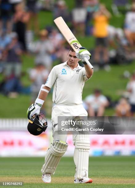 Tom Latham of New Zealand celebrates reaching his century during day 1 of the second Test match between New Zealand and England at Seddon Park on...