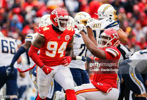 Terrell Suggs of the Kansas City Chiefs celebrates his third quarter sack with teammate Chris Jones of the Kansas City Chiefs against the Los Angeles...