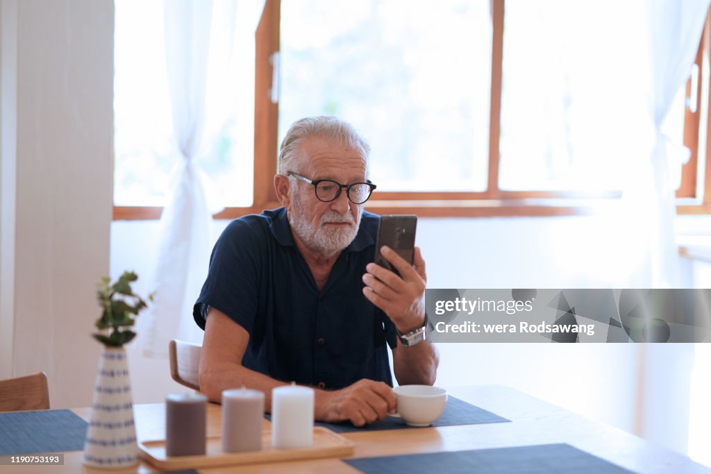 Older Man And Technology Use High-Res Stock Photo - Getty Images