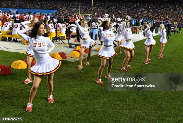 Trojans cheerleaders on the field during the 2019 Holiday Bowl game played on December 27, 2019 against the Iowa Hawkeyes at SDCCU Stadium in San...