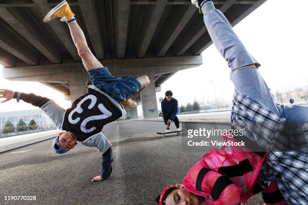 young people jump street dance - asian male dancer stock pictures, royalty-free photos & images